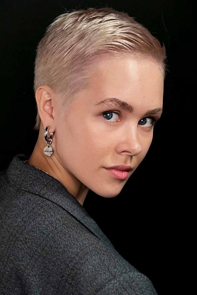 Slicked-Down Pixie with Side Part #androgynoushaircuts #androgynoushairstyles