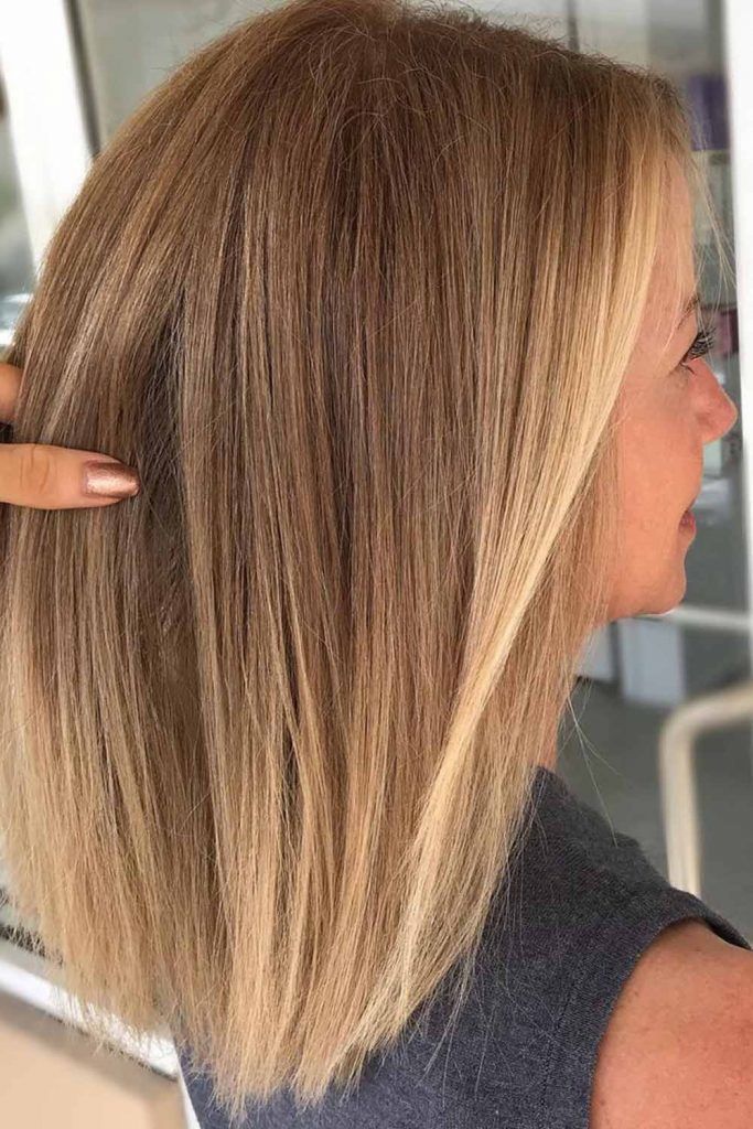 Pale To Platinum Blonde Balayage Hair For A Face Framing Style