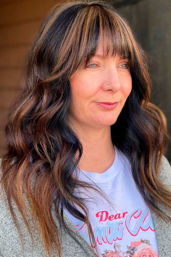Long Wavy Hairstyle With Face-Framing Bang