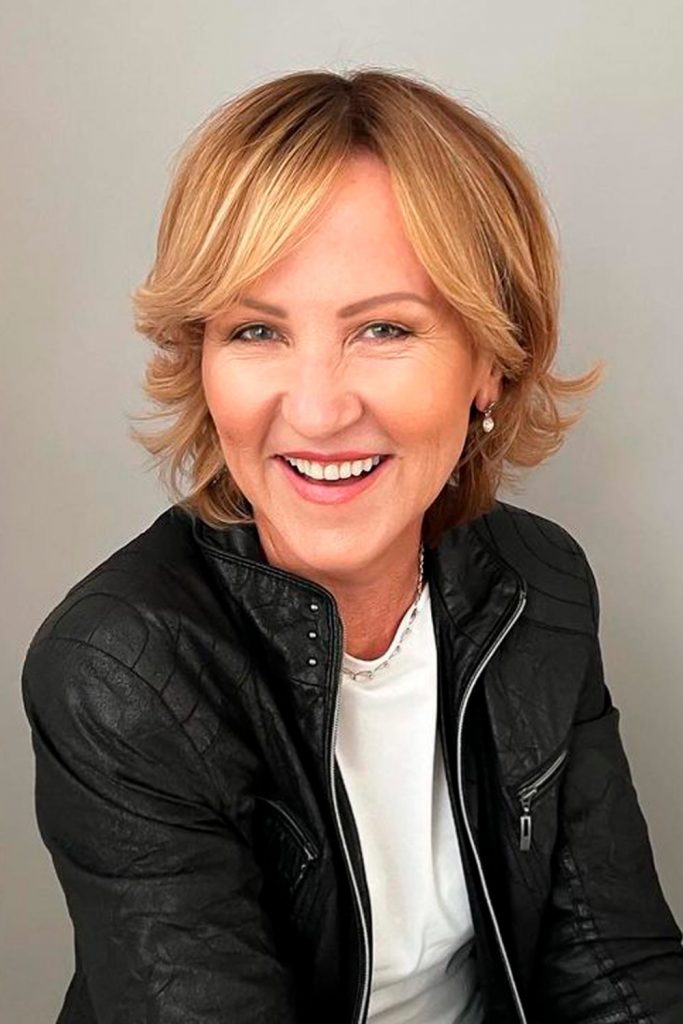 Layered Haircut with Curtain Bangs