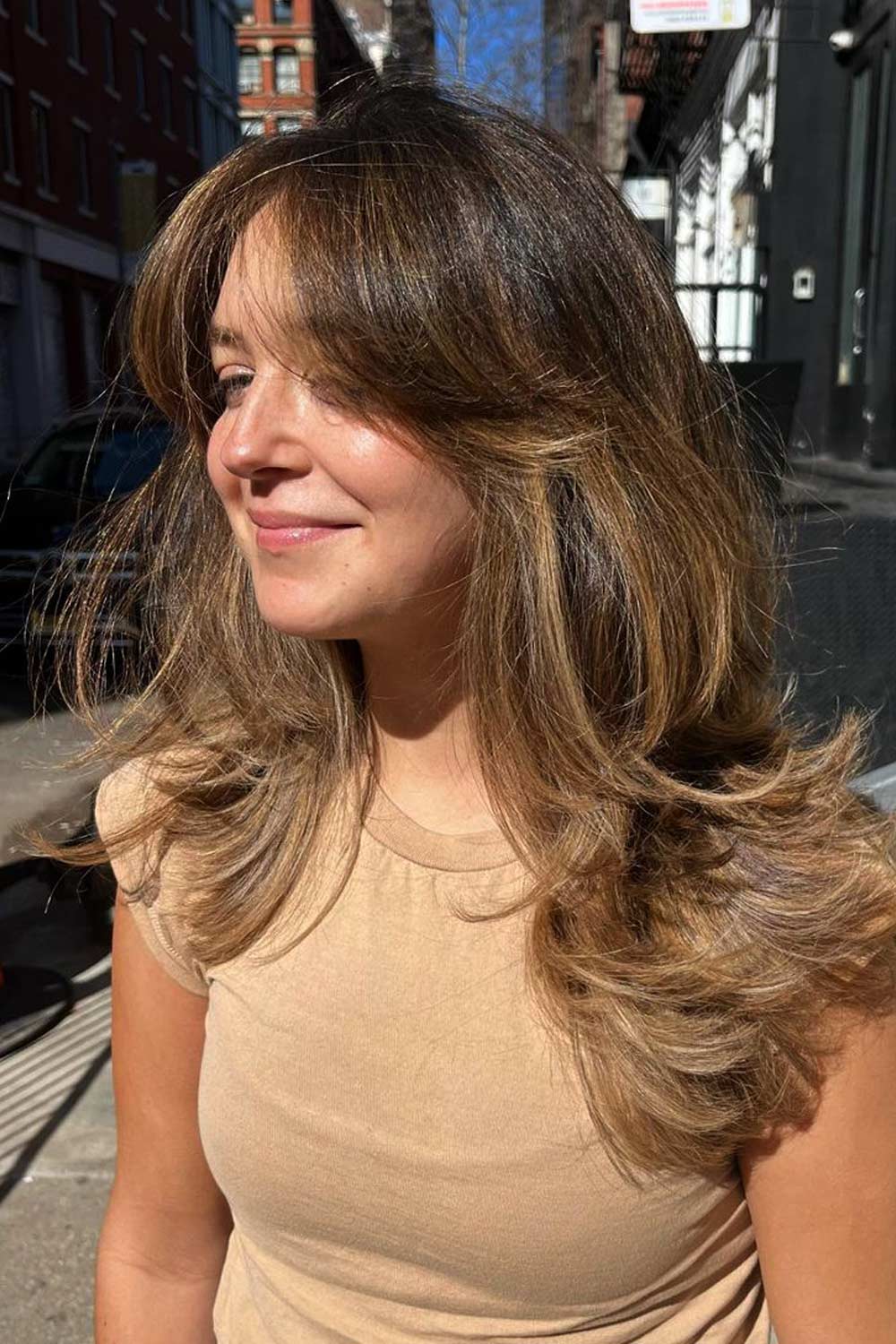 Butterfly Haircut with Bangs