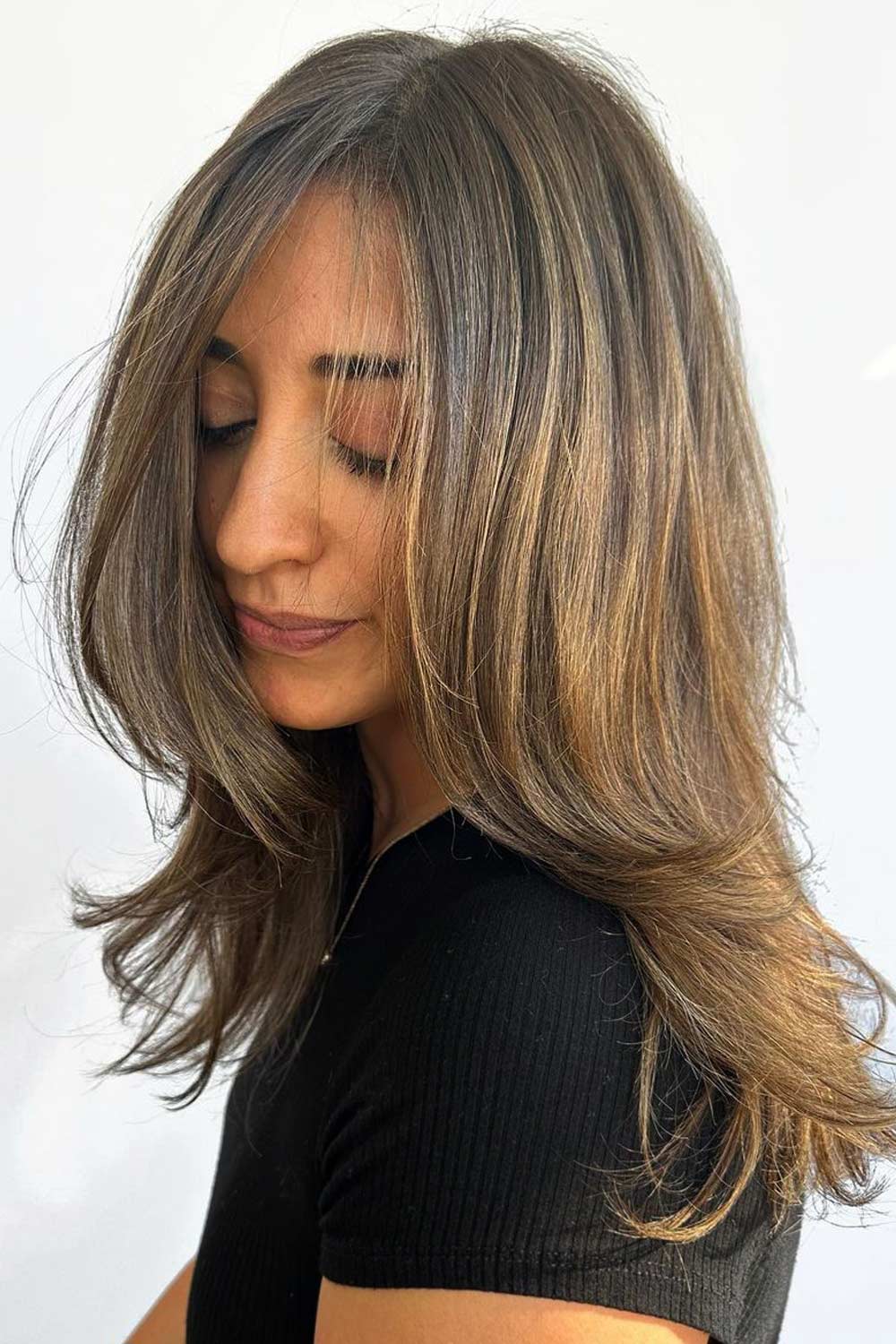 How to Style a Butterfly Haircut