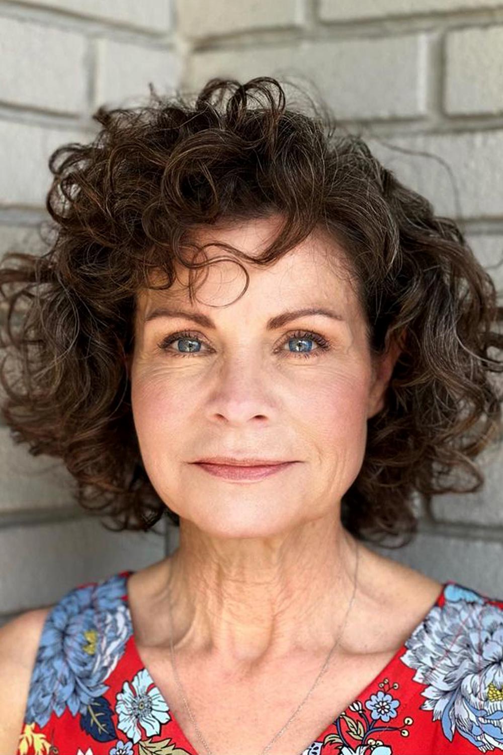 Curly Bob with Bangs for Older Women