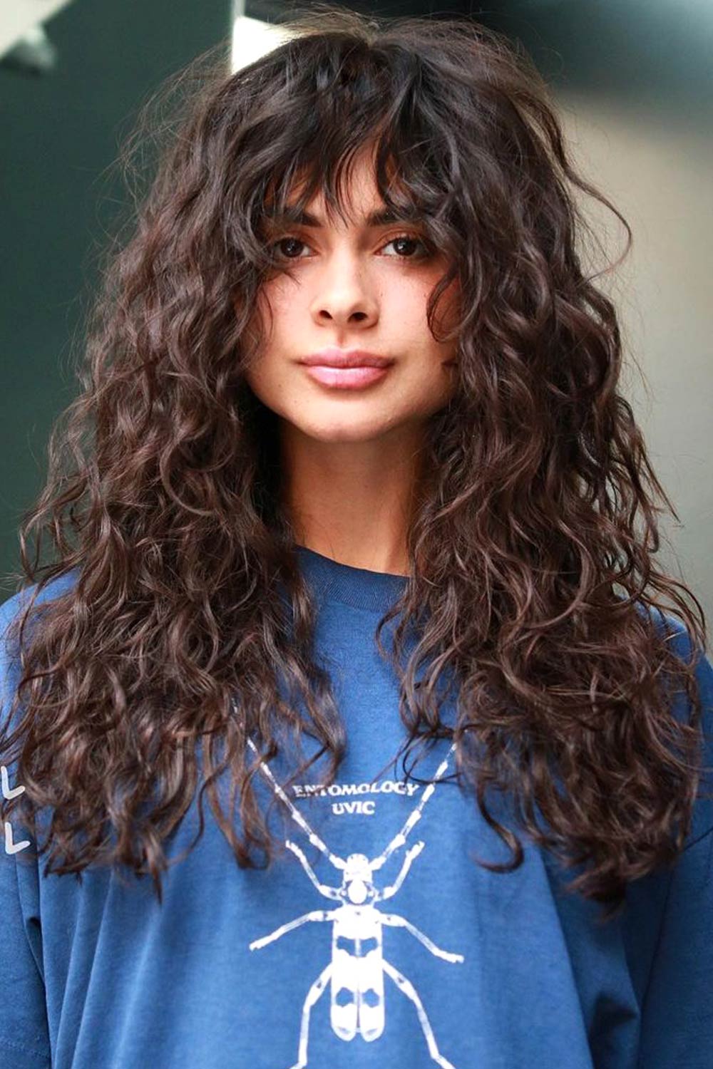 Long Curly Hair with Wispy Bangs
