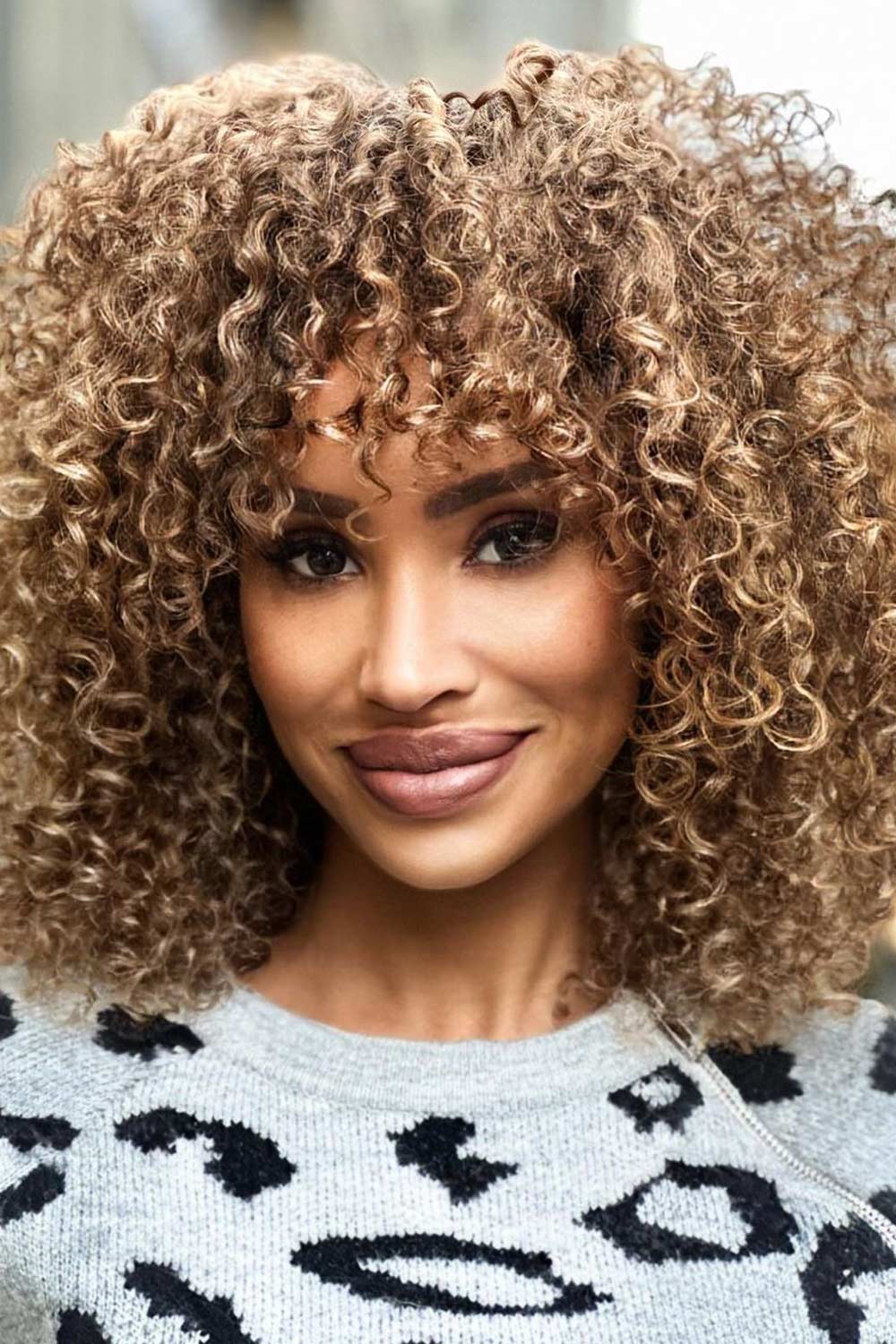 Curly Hair with Bangs and Layers