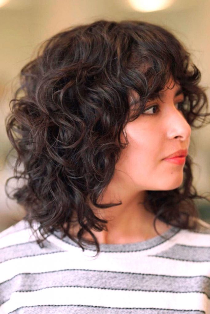 Curly Wolf Cut with Bangs