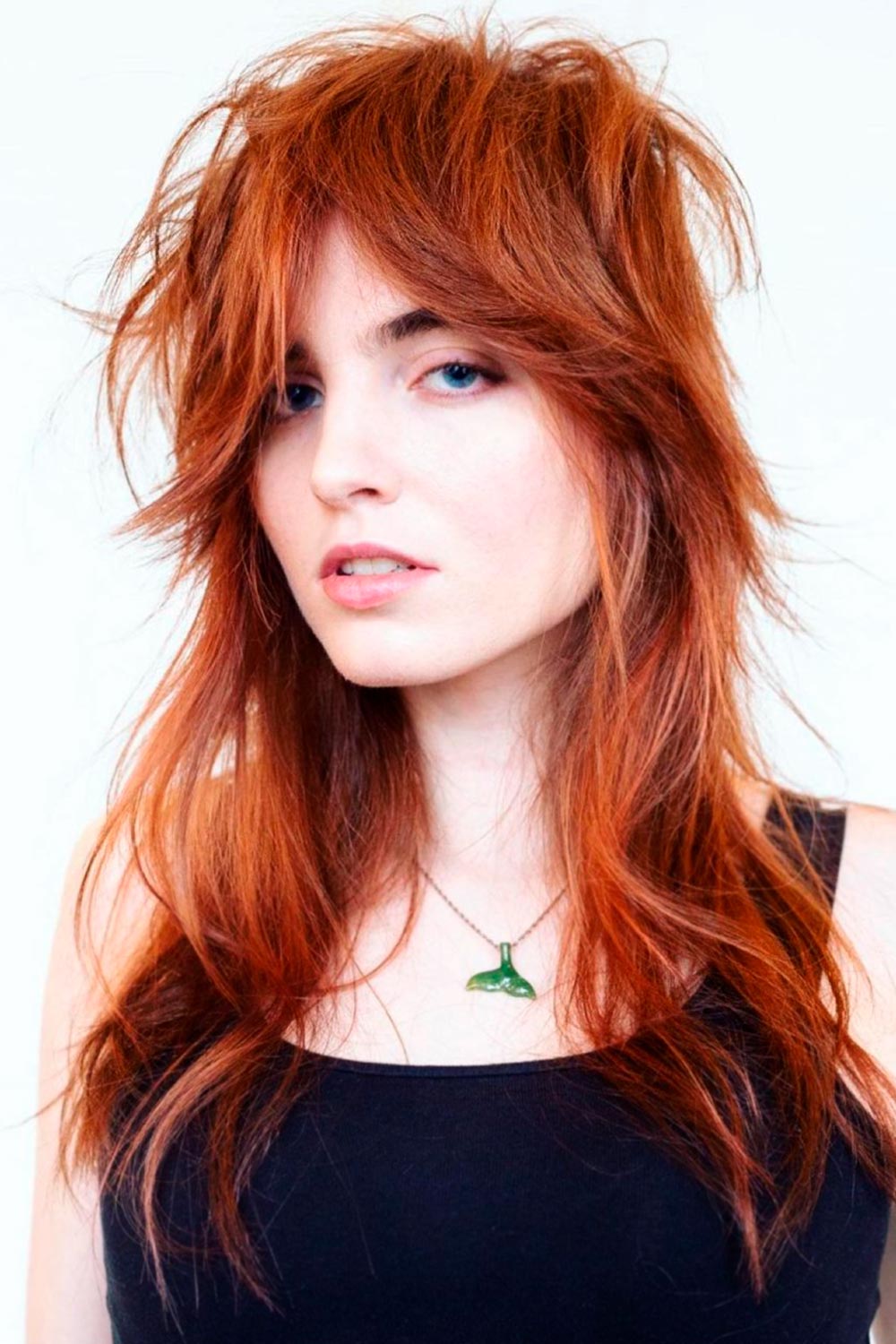 Long Wolf Cut with Curtain Bangs