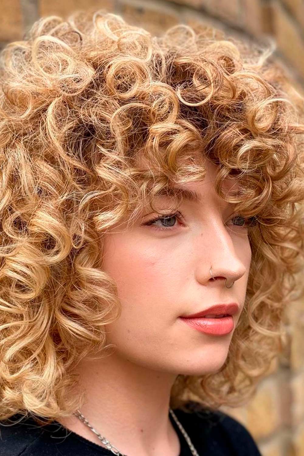 Curly Curtain Bangs