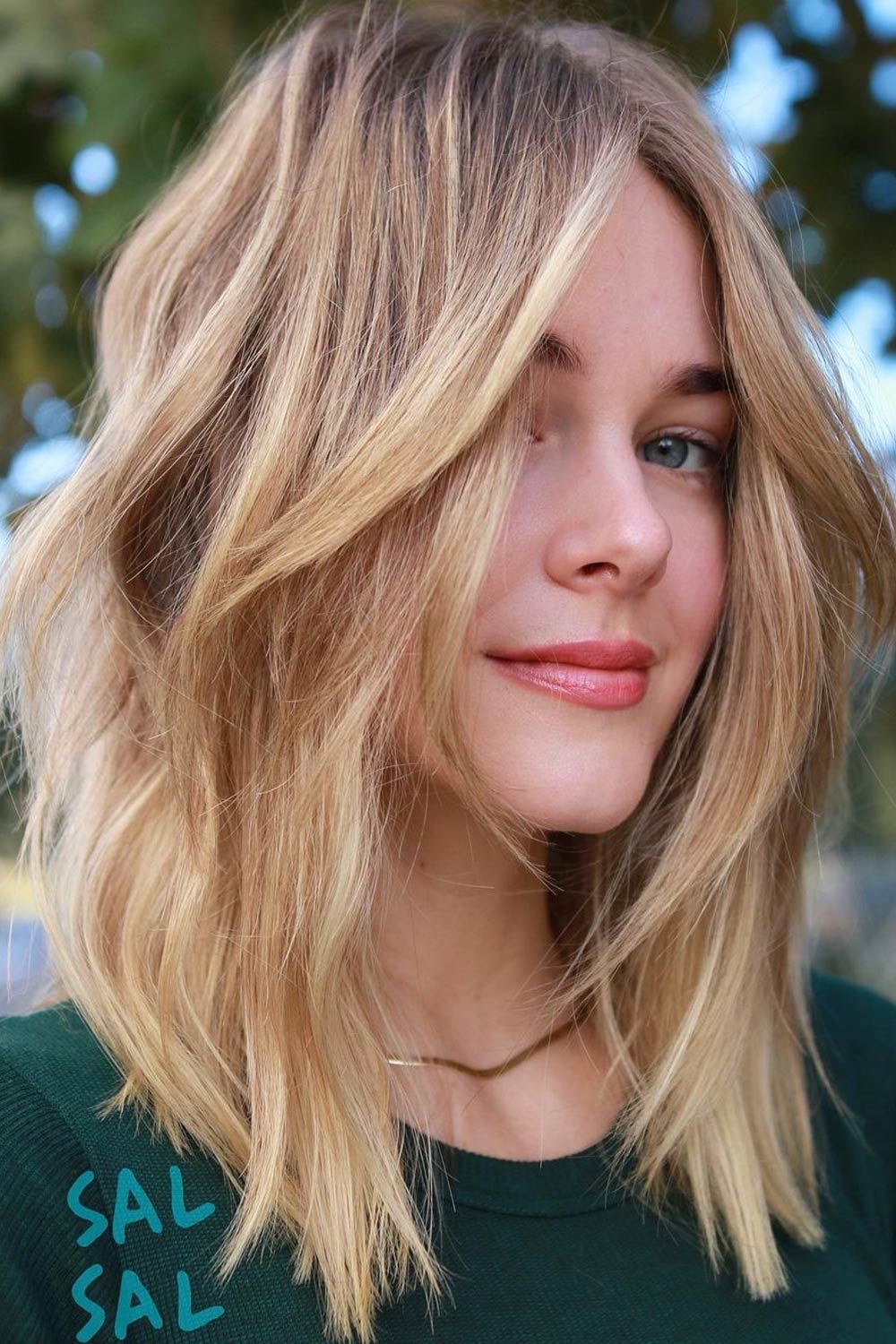 Layered Hair with Curtain Bang Style