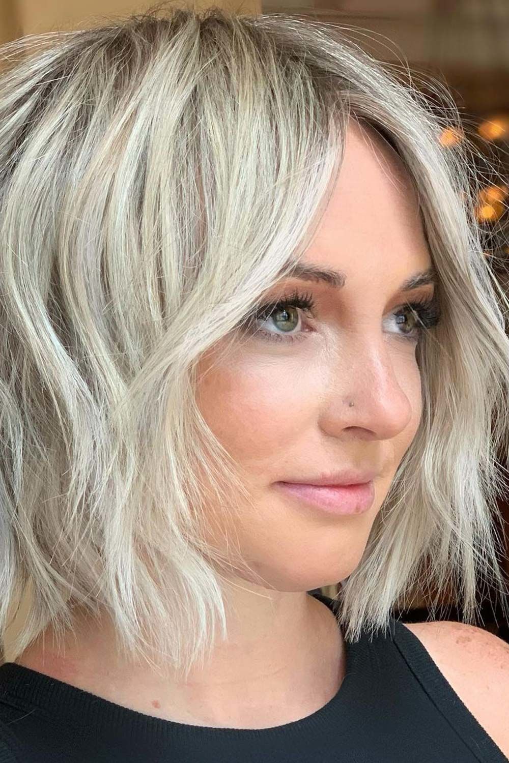 Short Blonde Bob Haircut & Curtain Bangs