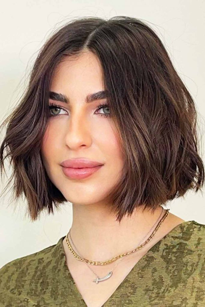 Center Parted Layered Blunt Cut