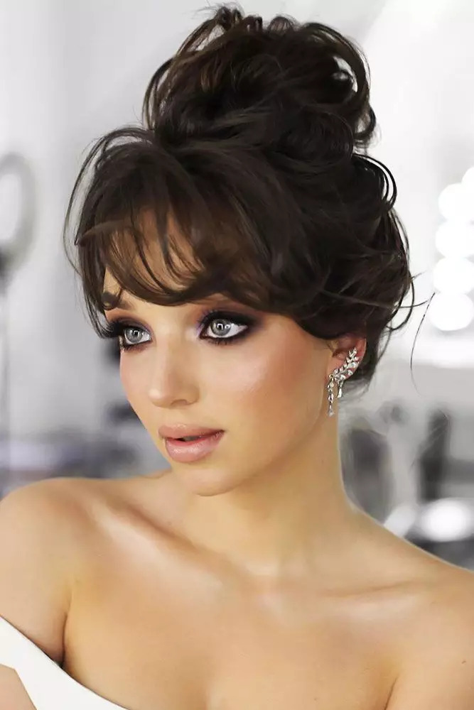 Messy High Bun With Bangs 