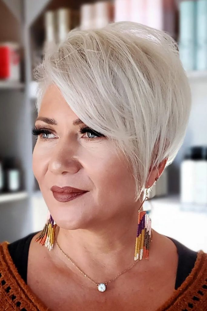 Sleek Platinum Pixie With Long Bang