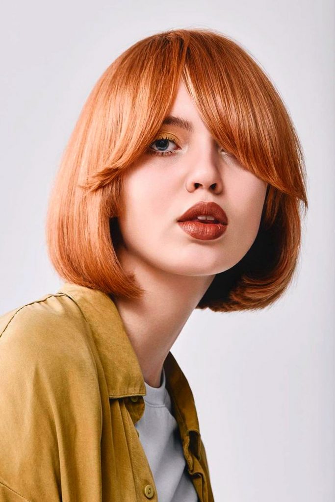 Red Bob and Modern Curtain Bangs