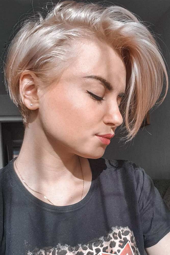 Pairing an undercut with wispy bangs can make any simple hairstyle look modern and chic while still being easy to maintain. Cute Long Side Pixie Cut #pixiecut #haircuts #longpixie #shorthair