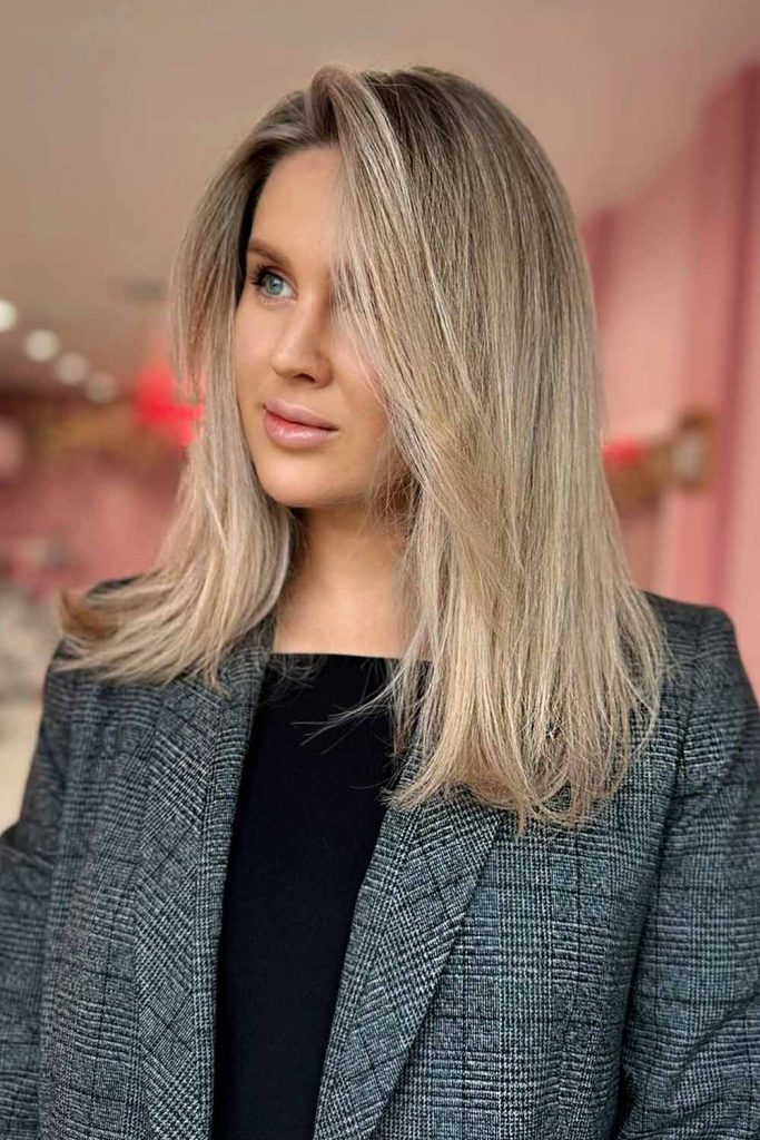 Icy Blonde Balayage with Warm Tones