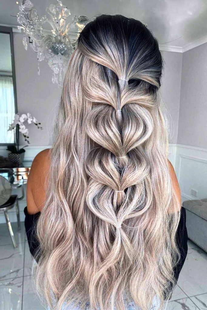 Sleek Wavy Platinum Blonde Highlights