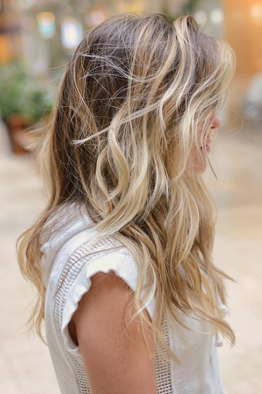 Get soft layers cut only in the front of your face for subtle framing.